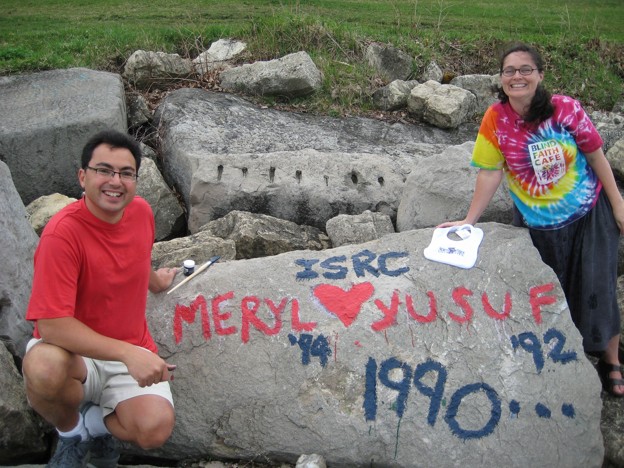Repainting the Rock, with a Northwestern baby bib laid on top of it.